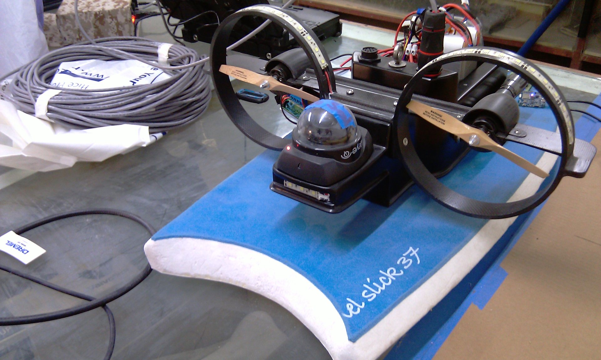 Styx: a cable-controlled surface vehicle to inspect under bridges.